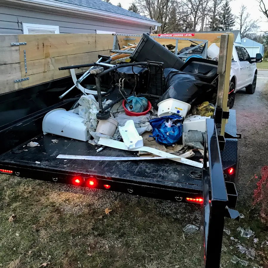 Roll-off dumpster delivered to a residential driveway in Glendive